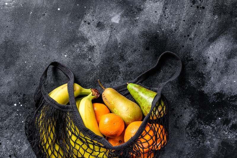 Friendly eco reusable bag of fruits. zero waste
