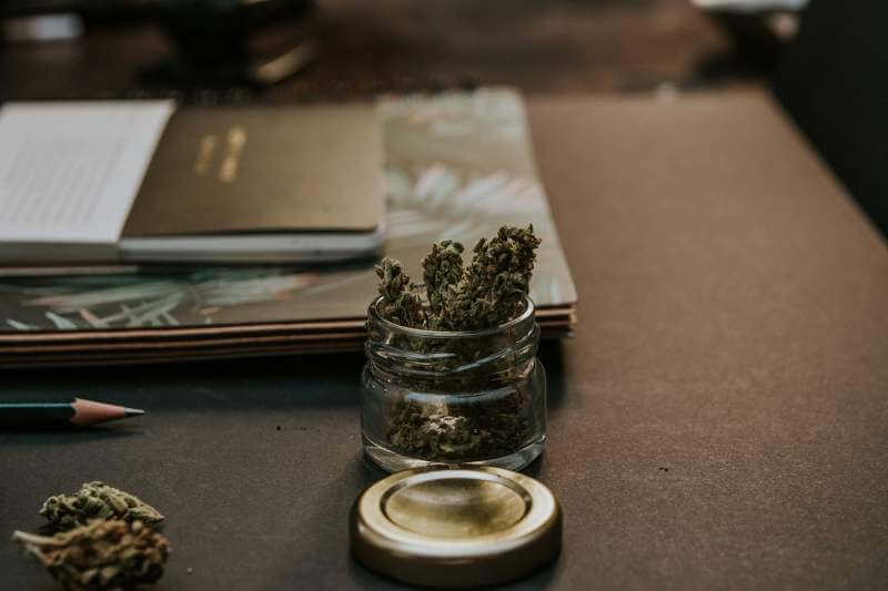 close-up-photo-of-kush-on-glass-container