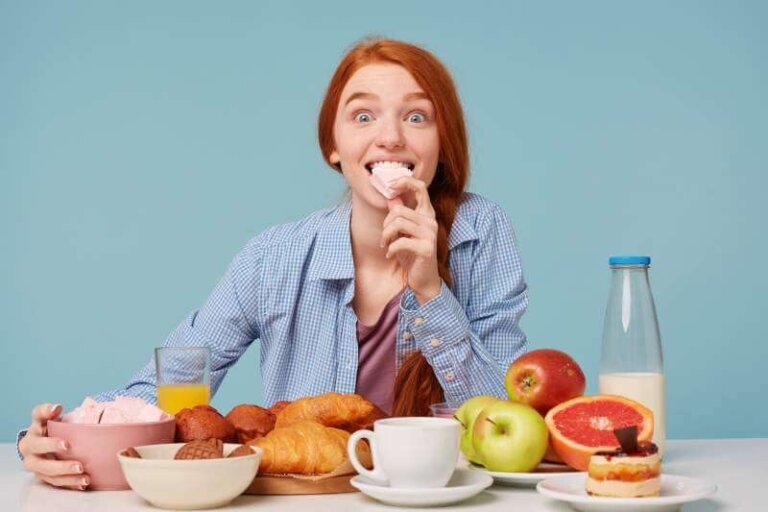woman-holding-marshmallow-having-variable-breakfast