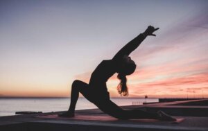 women-yoga-sunrise-morning