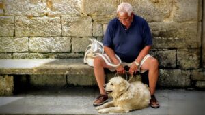 dog-seniorman-relaxing